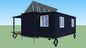 Nowoczesny kontenerowiec w Nowej Zelandii, rozbudowywany dom malutki z systemem solarnym Off Grid